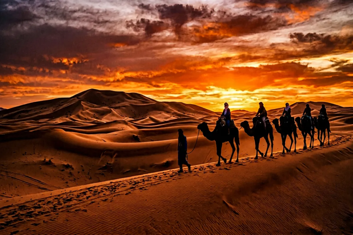 Sahara Desert camel caravan Morocco - must-see destinations